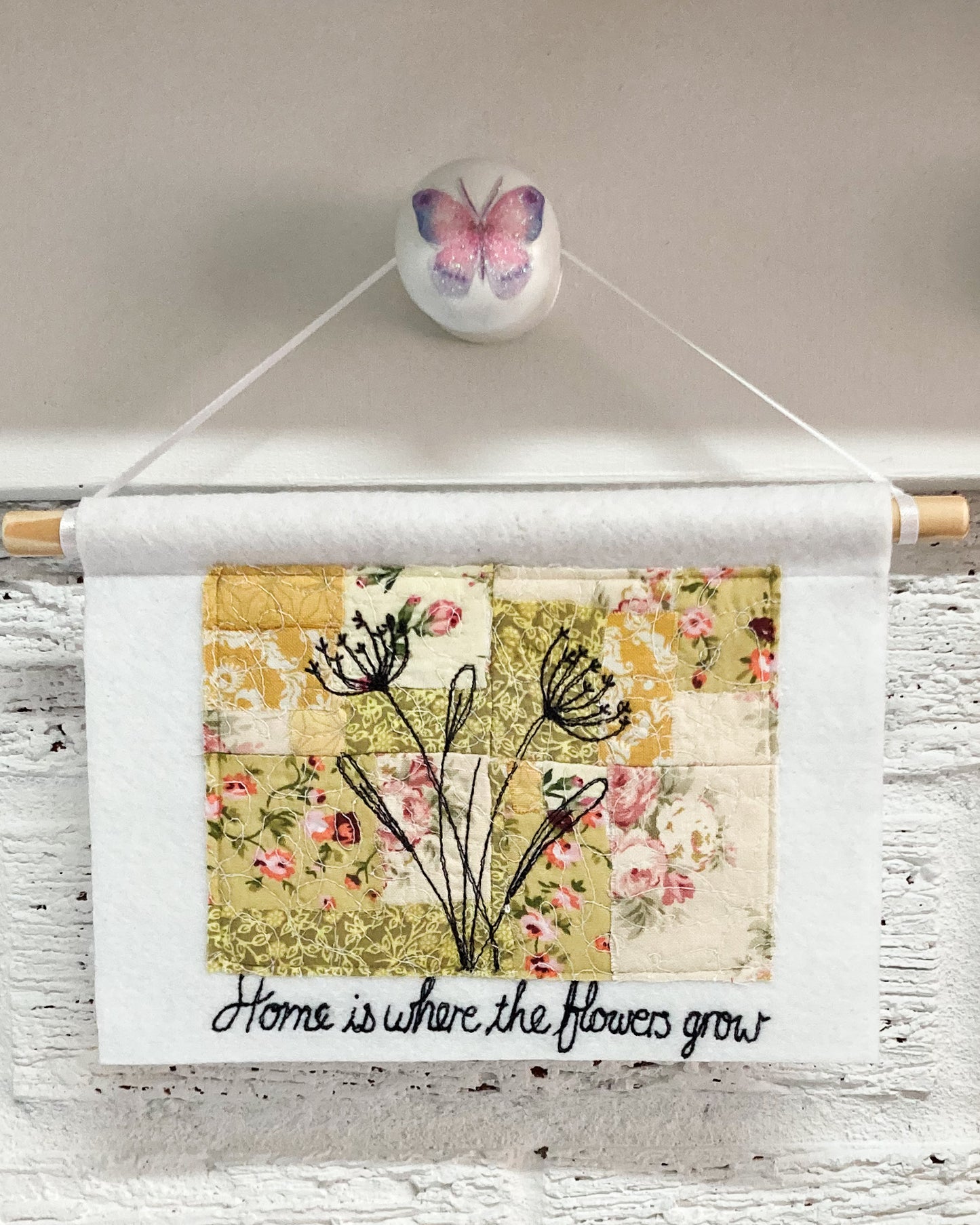 Home is where the flowers grow yellow wall hanging