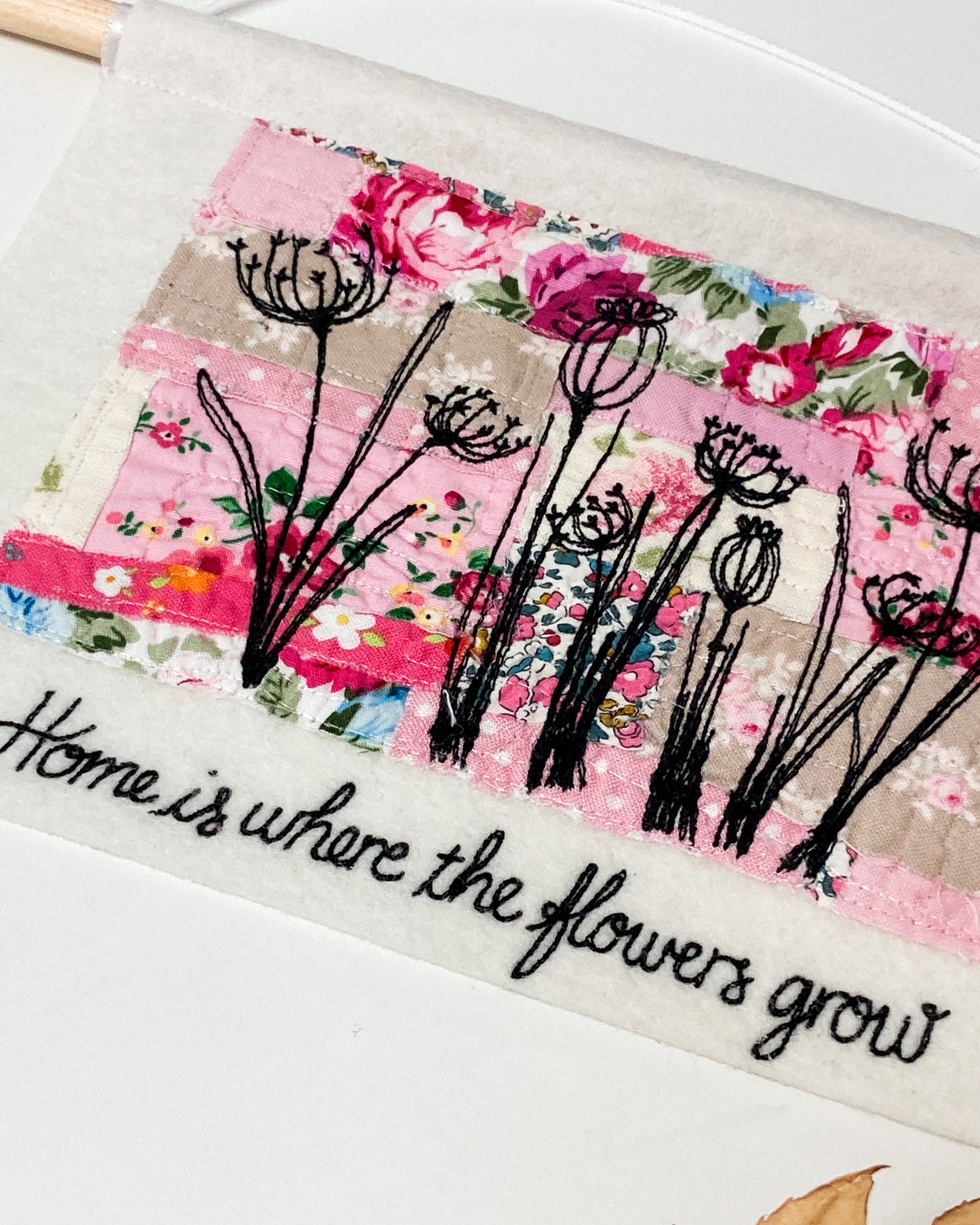 Home is where the flowers grow pink wall hanging
