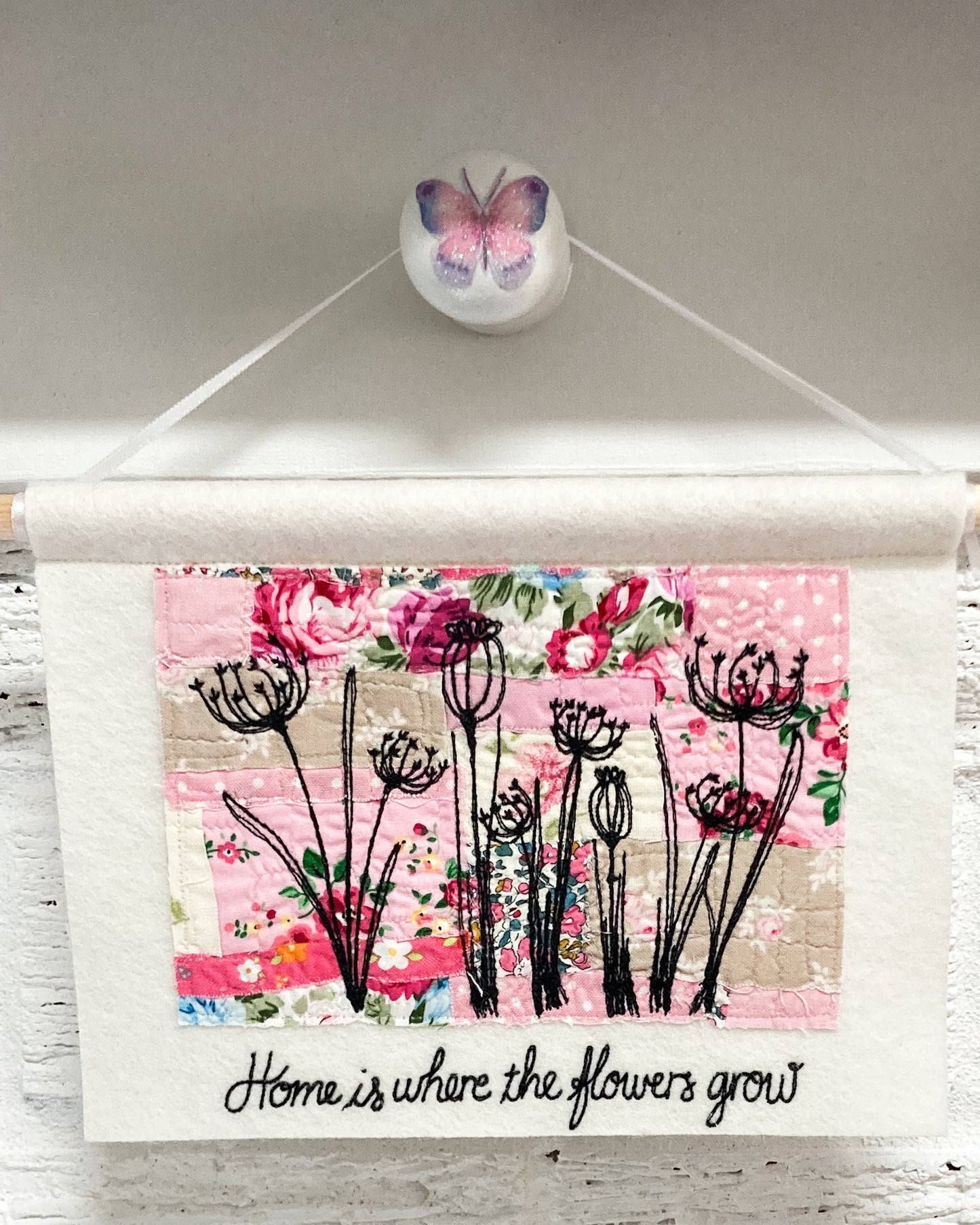 Home is where the flowers grow pink wall hanging