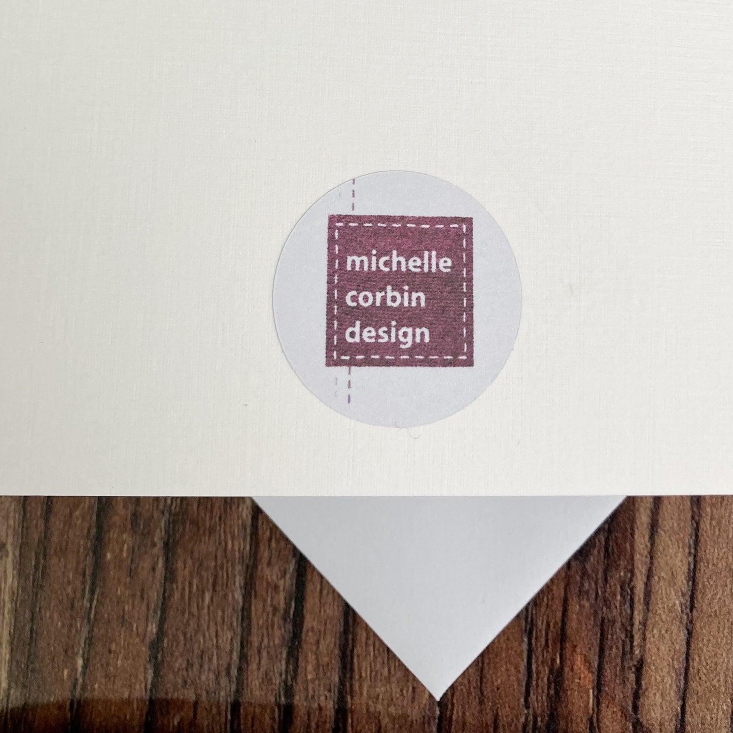 Michelle Corbin Design sticker on the reverse of a handmade card