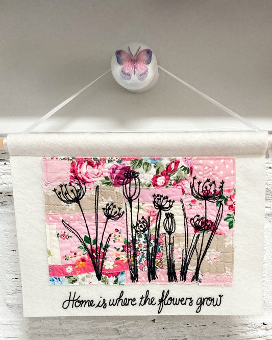 Home is where the flowers grow pink wall hanging