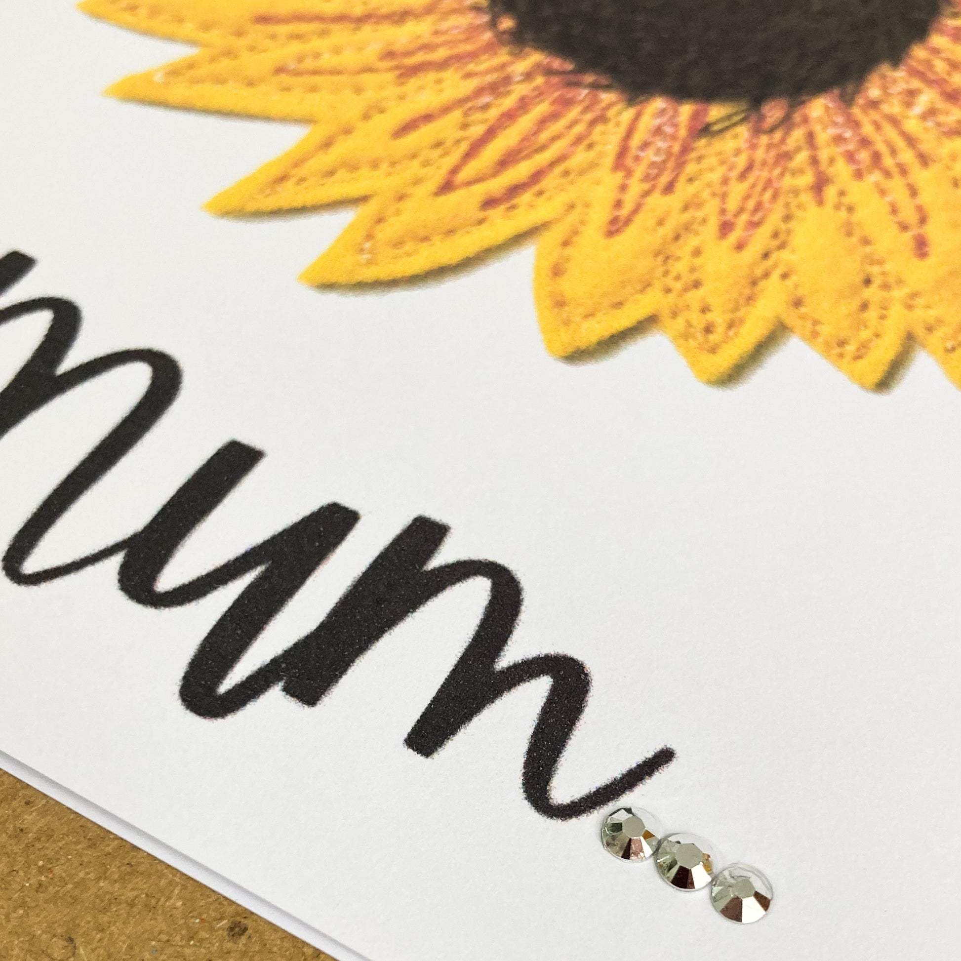 Close up of Embroidered Sunflower, with the word Mum, plus 3 diamantes