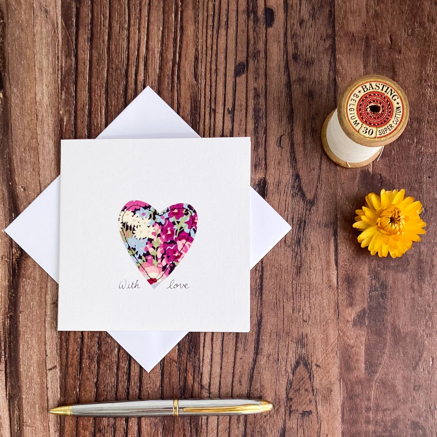 Greetings Card with an Applique Liberty Heart and the words With Love hand written plus envelope, pen, dried flower and vintage thread